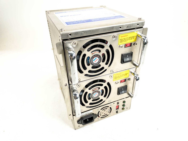 Topower TOP-RS1A dual hot-plug ATX power supply – front angled view showing two stacked PSU modules with fans and power switches