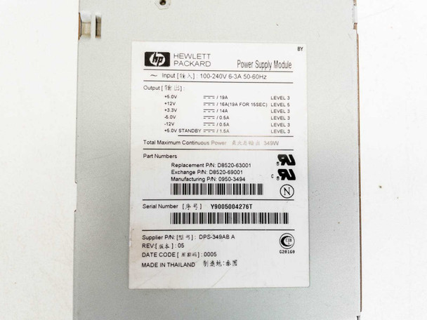 HP D8520-63001 power supply label showing part numbers, input/output specs, and serial number