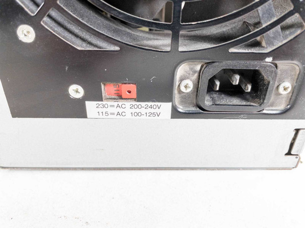 IBM API-2040 rear panel detail showing voltage selector switch (115V/230V) and IEC AC power inlet