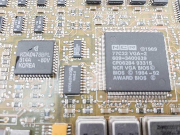 Close-up of NCR 77C22 VGA-2 chip (609-3400639) and Award BIOS markings on NCR Model 5000 system board