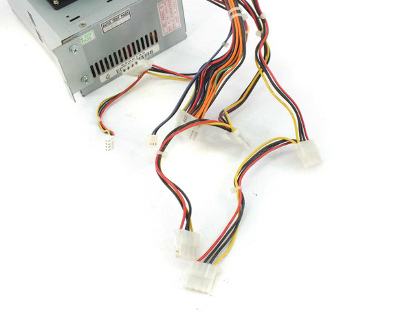 Power Tronics WK-6200DL3N 200W ATX power supply — close-up of output connector bundle including 4-pin Molex and floppy power connectors