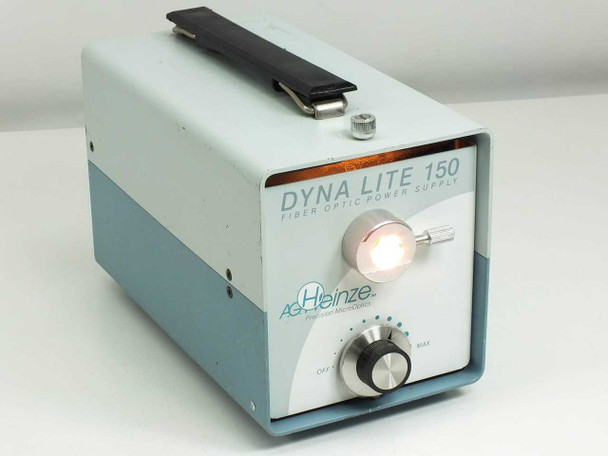 A.G. Heinze Dyna Lite 150 FO-150 — front-left view with unit powered on and lamp illuminated through fiber output port