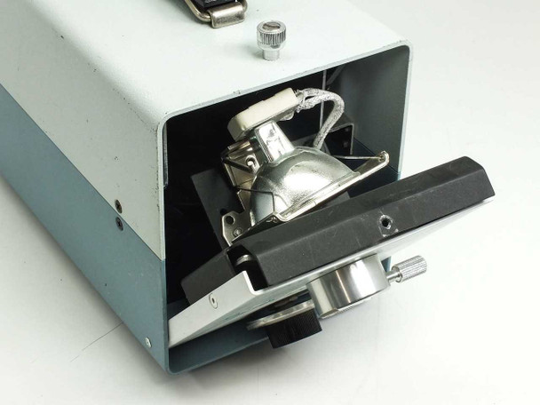 A.G. Heinze FO-150 interior view — lamp assembly with EJA/EKE lamp in reflector housing, fiber coupling optics and adjustment stage visible
