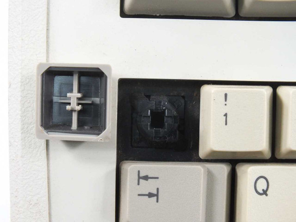 Honeywell Bull 115ST13-11E-1-J key switch closeup showing one keycap removed and exposed switch mechanism