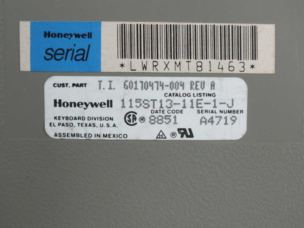 Honeywell Bull 115ST13-11E-1-J label closeup showing model number, part number 30170474-004 REV A, date code 8851, serial number A4719, assembled in Mexico