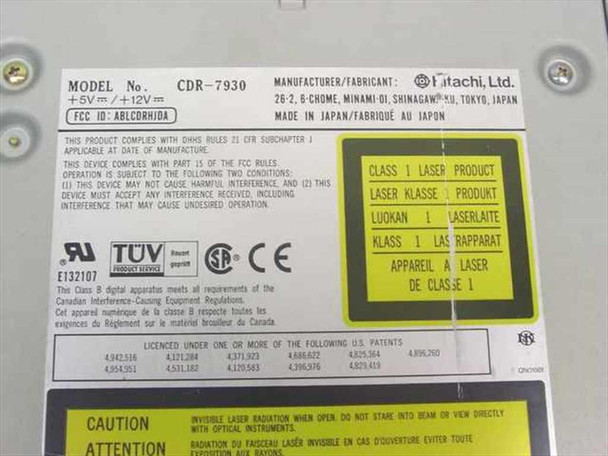 Hitachi CDR-7930 rating label showing model number, manufacturer details, FCC ID ABLCORH10A, Class 1 laser warning, and certifications