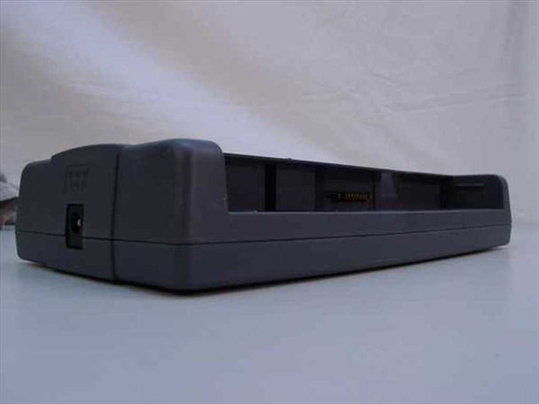 Toshiba PA2508U external battery charger cradle – rear and side view showing battery slot and connector