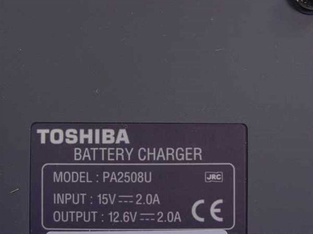 Toshiba PA2508U battery charger label showing model number, 15V 2.0A input and 12.6V 2.0A output ratings