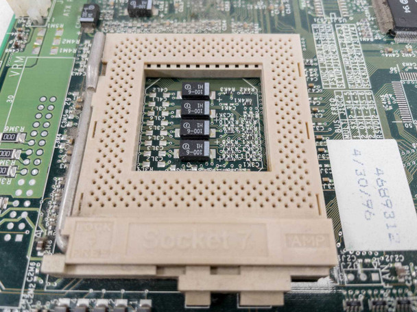 Intel AA652605-501 Socket 7 motherboard – close-up of empty Socket 7 CPU socket with AMP label and date code sticker