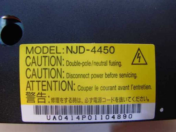 Toshiba NJD-4450 P000221950 power supply – label showing model number, caution markings, and barcode