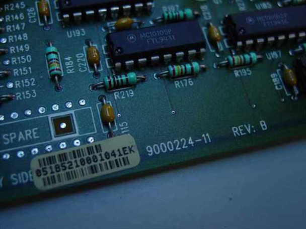 Cabletron IRBM 9000224-11 PCB close-up showing part number 9000224-11, REV: B silkscreen, barcode label, and Motorola MC10105P IC