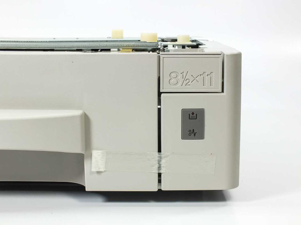 Ricoh Type 140F paper feed tray — close-up of right front corner showing 8.5x11 paper size label and indicator button