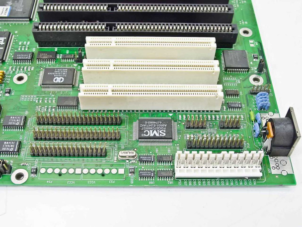 Micronics M54Pi motherboard — close-up of PCI slots and SMC Super I/O chip