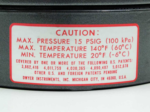 Dwyer Magnehelic 2000-0 C — caution label showing Max. Pressure 15 PSIG (100 kPa), Max. Temp 140°F (60°C), Min. Temp 20°F (-6°C), patent numbers, and Dwyer Instruments Michigan City IN