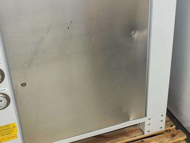 Motivair MPC-FC-0500 — stainless steel exterior side panel showing light surface smudging and minor storage marks consistent with a new unit