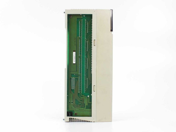 Sharp JW-64NC DC Input Module – bottom view showing PCB, backplane edge connector, and internal circuit board