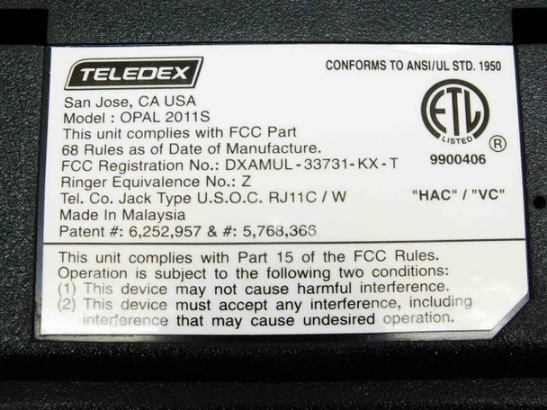 Teledex OPAL 2011S bottom label showing model, FCC registration DXAMUL-33731-KX-T, RJ11C jack type, HAC/VC markings, and ETL listing