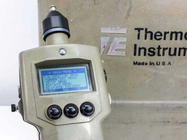 Thermo Environmental 580 EZ front panel close-up showing LCD main menu with Calibration, Parameter, Setup, Reports, and Response Factors options