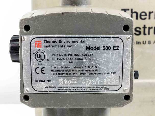 Thermo Environmental 580 EZ rating label close-up reading Model 580 EZ, Class I Division 1 Groups A B C D, intrinsic safety rating 74XL, CE mark, serial number, TEI battery pack P/N 13080