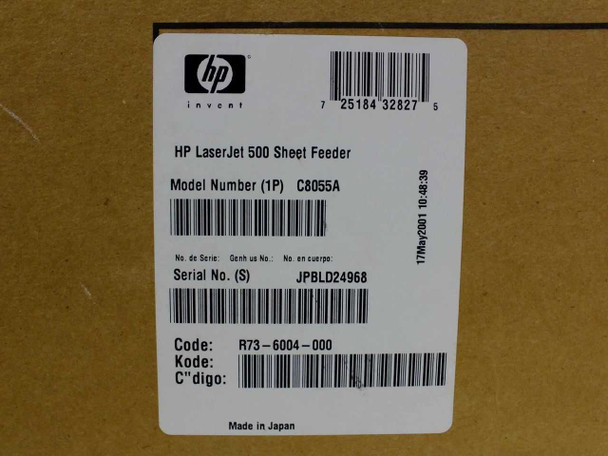 HP C8055A 500-Sheet Paper Feeder box label — showing model number C8055A, serial number JPBLD24968, barcode, and Made in Japan marking