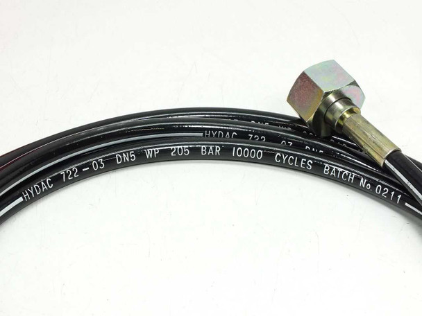 Hydac hose close-up showing printed markings: HYDAC 722-03 DN5 WP 205 BAR 10000 CYCLES BATCH No 0211