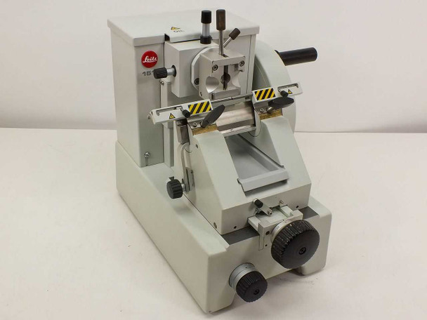 Leitz 1512 rotary microtome — three-quarter front view showing specimen clamp, knife stage, and hand wheel