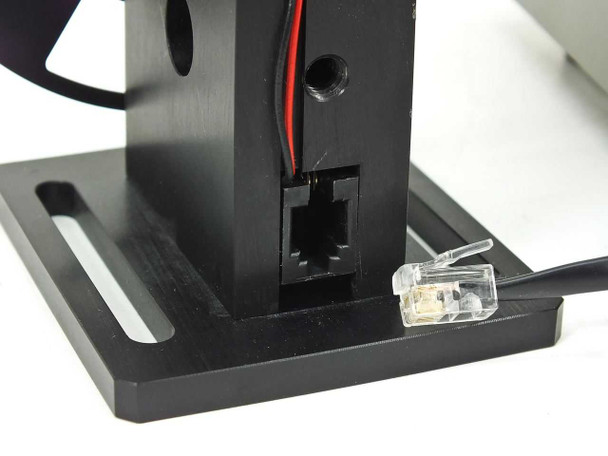 SR541 motor head base close-up showing RJ connector port on stand base and red/black motor wires
