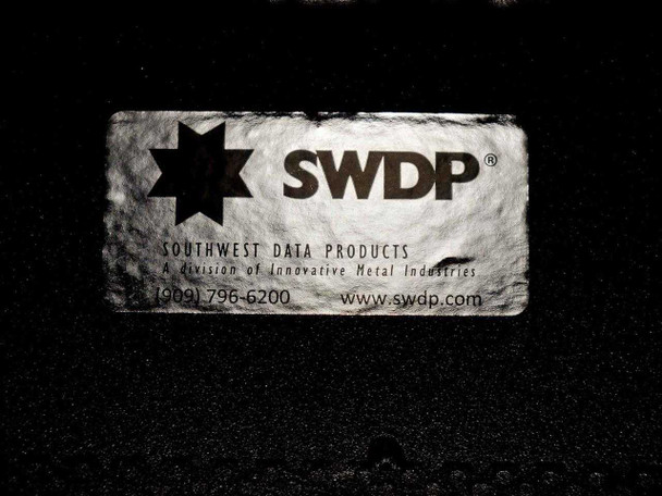 Southwest Data Products SWDP brand label on rack cabinet — reads 'A division of Innovative Metal Industries'