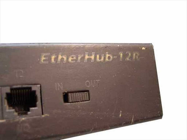 Accton EtherHub 12R close-up of right-side panel showing model name label, IN/OUT switch, and RJ-45 port