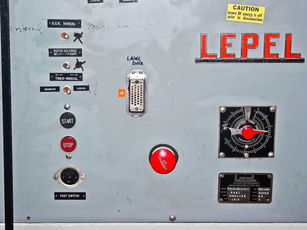 Left side of front panel showing SCR Manual, Water Solenoid, Timer-Manual, Remote/Local switches, Start and Stop pushbuttons, foot switch jack, LABEI data connector, large red E-stop button, and Lepel logo badge