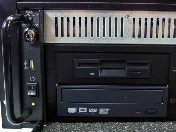 SBS Y8373950 front left panel — Disk Activity LED, door lock, USB port, toggle power switch, status LEDs, floppy drive, and DVD/CD-RW drive