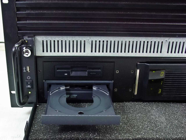 SBS Y8373950 DVD/CD-RW combo drive with disc tray open — floppy drive visible above