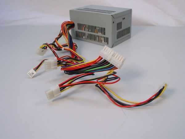 Acer AP4300 145W ATX power supply – side view showing full cable harness including 20-pin ATX main connector, 4-pin Molex, and floppy connectors