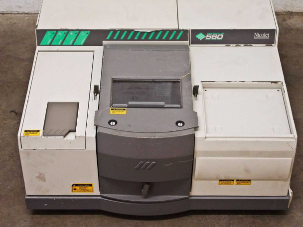 Nicolet Magna-IR 560 FTIR Spectrometer — full front view with sample compartment door open, showing sample area and sliding door assembly
