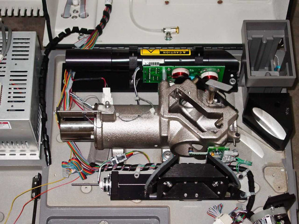 Close-up of Nicolet Magna-IR 560 interferometer moving mirror/motor assembly with aluminum optical mount and colored wiring harness