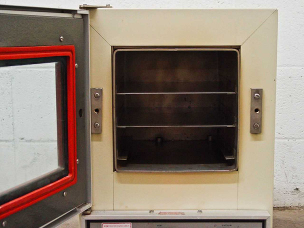 Precision Scientific Model 19 Vacuum Oven interior view with door open showing two stainless steel wire shelves and shelf support brackets