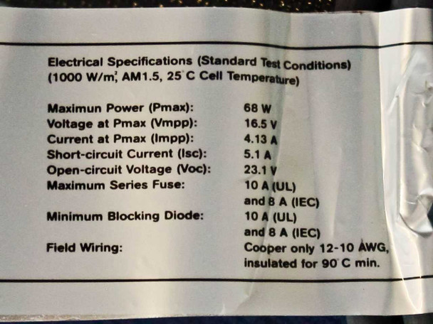 Uni-Solar PVL-68 electrical specifications label showing Pmax 68W, Vmpp 16.5V, Impp 4.13A, Isc 5.1A, Voc 23.1V, fuse and wiring ratings