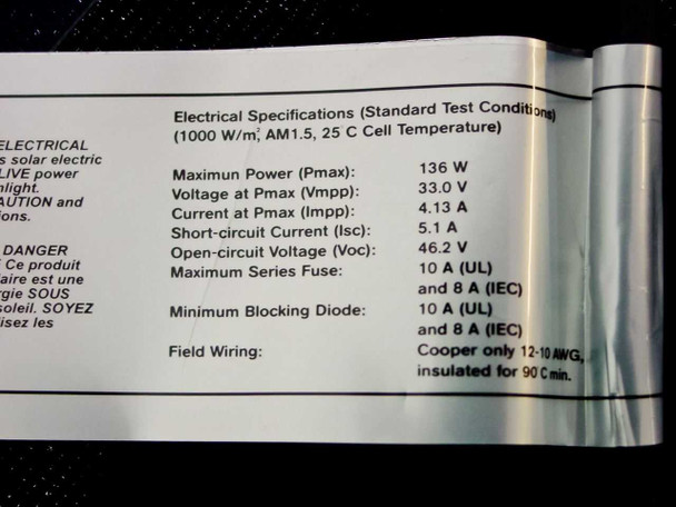 Uni-Solar PVL-136 electrical specifications label showing 136W Pmax, 33.0V Vmpp, 4.13A Impp, 5.1A Isc, 46.2V Voc at standard test conditions