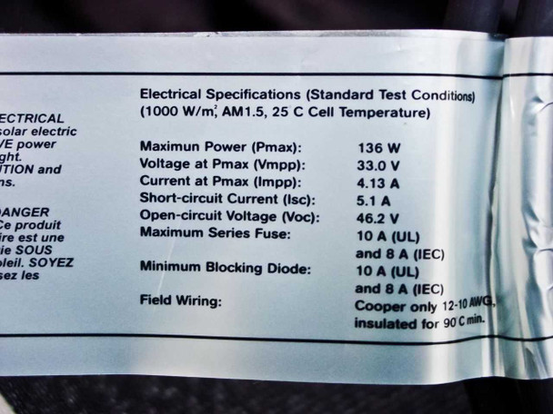 Uni-Solar PVL-136 electrical specifications label showing Pmax 136W, Vmpp 33.0V, Impp 4.13A, Isc 5.1A, Voc 46.2V