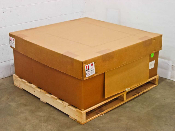 Uni-Solar PVL-136 carton of 30 solar panels sealed in large cardboard box on wooden pallet
