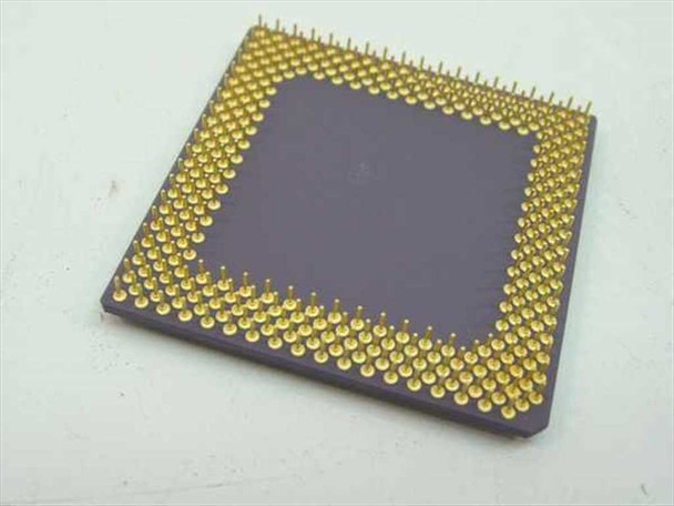 AMD K6-200ALR processor bottom view showing full array of gold Socket 7 PGA contact pins in good condition