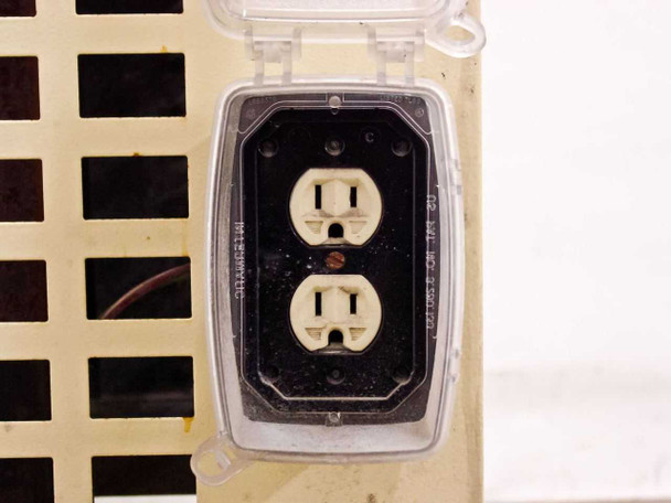 TMS 0140 electrical outlet receptacle on side panel with weatherproof cover — duplex 120V outlet on louvered cabinet side