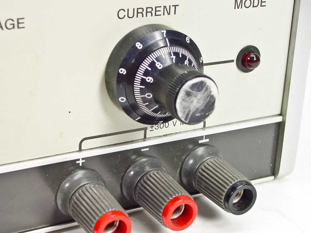 HP 6114A Precision Power Supply — close-up of current control knob, Mode indicator lamp, and front output banana jacks with ±300V max marking