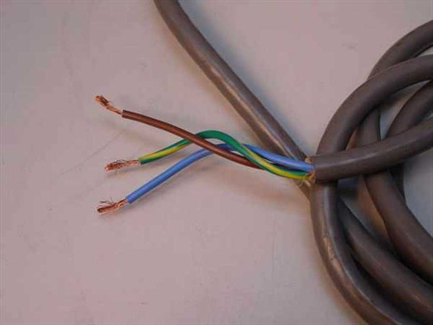 Hardwired input power cable of Digital 874-E power supply showing bare-end brown, blue, and green-yellow conductors