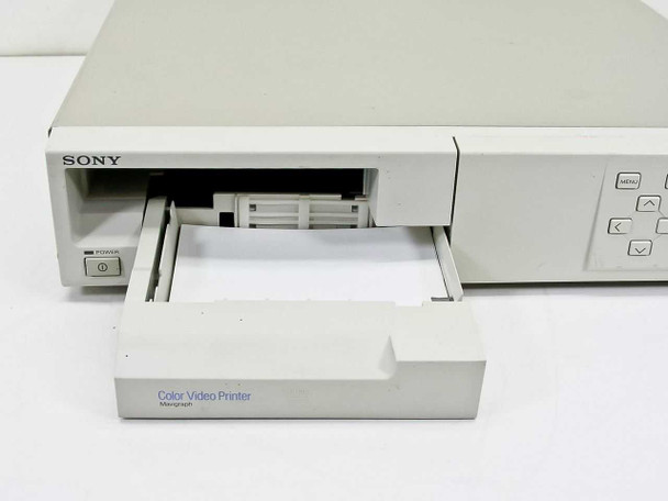 Sony UP-1200A — front panel close-up with paper tray extended open showing interior and Mavigraph label
