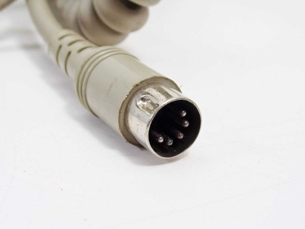 Zenith Data Systems keyboard 5-pin DIN male connector close-up showing 5-pin plug tip and coiled cable