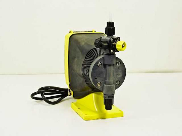 LMI Milton Roy AA971-358SI dosing pump — right side view showing black diaphragm pump head, liquid end assembly, and top discharge fitting