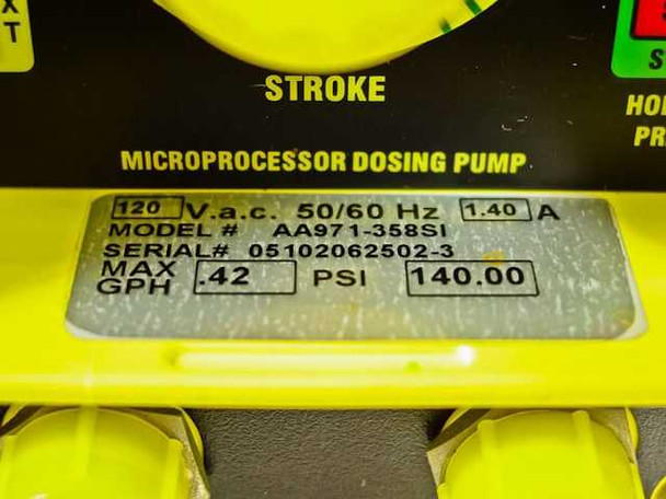 LMI Milton Roy AA971-358SI rating plate — showing 120V AC 50/60Hz 1.40A, Max GPH 0.42, PSI 140.00, and serial number