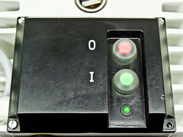 Balzers Pfeiffer DUO 016B control panel — black box with O/I markings, red stop button, green start button, and green power indicator LED