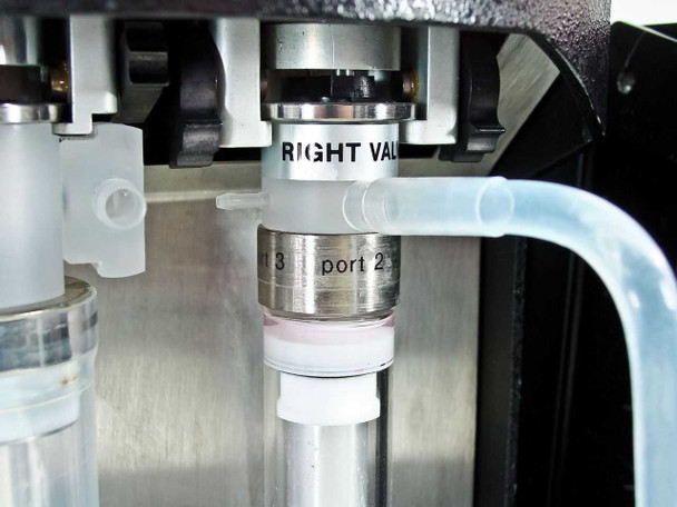 Titertek Digiflex 62187 right valve syringe close-up showing port 2/3 labeling and tubing connections